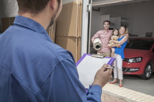 An organized packing of items and moving boxes in a Mayfair setting.