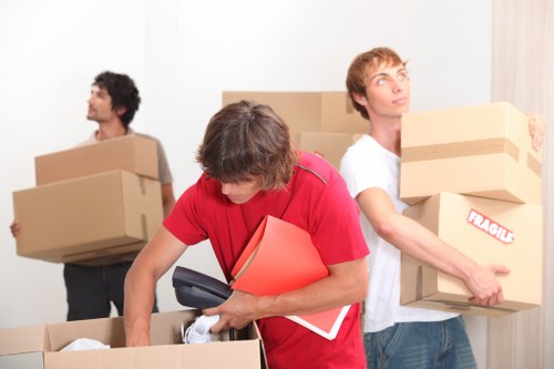 Professional moving team preparing items in a Mayfair residence