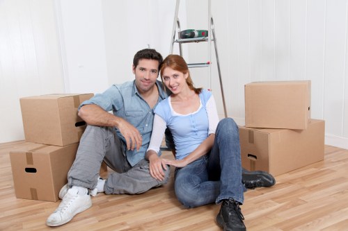 Experienced movers handling office equipment